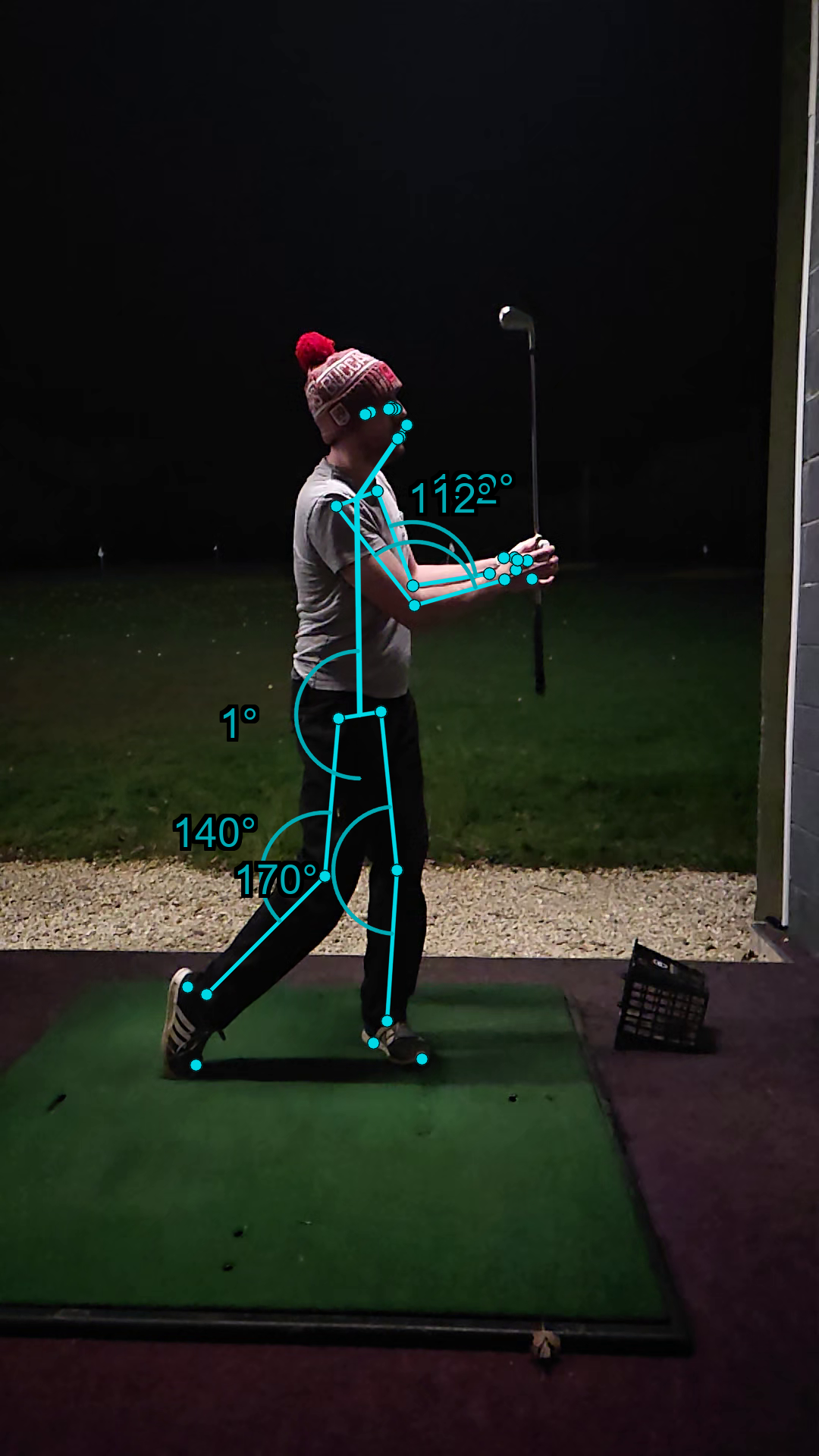 Golf swing finish position with pose overlay and angle measurements
